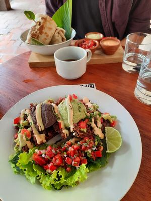 Breakfast burrito and Hashbrown Waffle with complementary coffee during brunch hours at Once:Once in Antigua