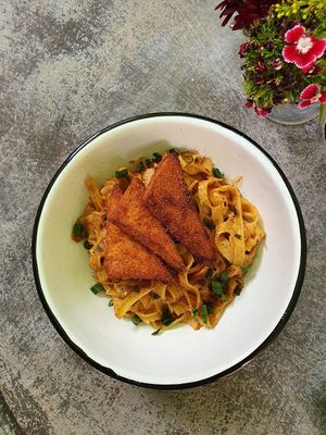 alfredo pasta and tofu nuggets at Once:Once in Antigua