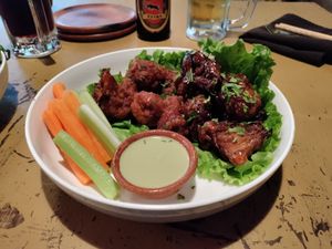 Half serve each of BBQ and buffalo cauliflower wings at Once:Once in Antigua