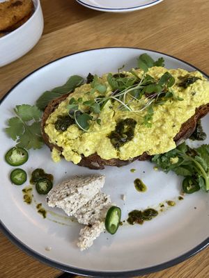Scrambled tofu with chimmichurri  at Little Black Pug in Mount Gravatt
