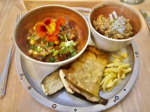 Baked courgette with chickpea & aubergine stew, pickled fennel, spiced quinoa and Armenian onion bread at Chidakasha Skye in Isle Of Skye