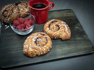 Sugar, cinnamon, pecans and orange extract turn our vegan croissant into the perfect cinnamon roll. at Metro Croissants in Parma