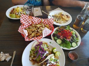 La mesa mushroom stroganoff loaded fries and tacos al pastor at Vertical Diner and The Gold Room in Portland