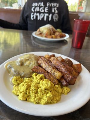 Biscuits and gravy breakfast with tempeh bacon, potatoes and tofu scramble !  at Vertical Diner and The Gold Room in Portland