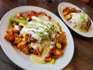 This was sooo freakin good!!! La Mesa for me and Breakfast burrito for the hubs! at Vertical Diner and The Gold Room in Portland