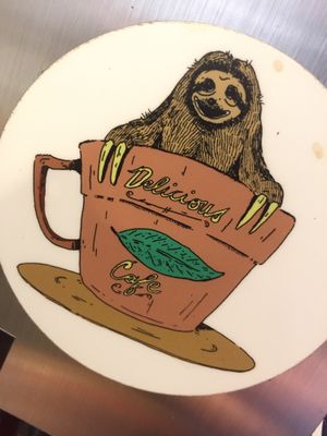 sloth pics everywhere! it's awesome! at Delicious Cafe in Chicago
