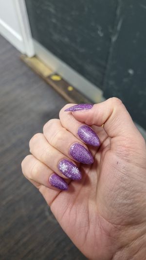 Christmas snowflakes on purple at Nova Nails in Glasgow