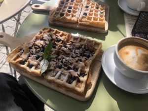 Vegan waffles with mascarpone and berries.  at LUUC Café in Saarbrucken
