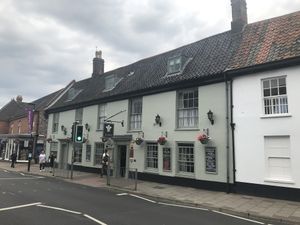 View from the street at The Feathers Hotel in Holt