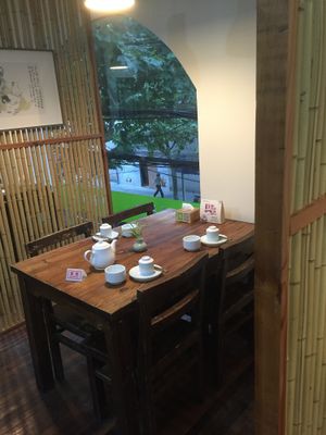 Set table by the outside wall windows. at Ji Xiang Cao - Lucky Zen & Veg Restaurant in Shanghai