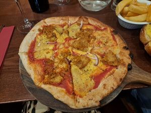 Cajun chicken pizza. Always way way way too cheesy but if that's your thing, you'll like it. at Palominos in Erskine