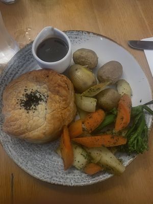 Mushroom Wellington with its side of well-seasoned root veggies and gravy  at Tullie Inn in Balloch