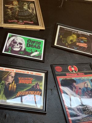 Framed Posters in Lobby at The 4th Horseman in Long Beach