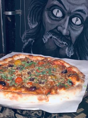 Frailty Pizza with Wall Art at The 4th Horseman in Long Beach