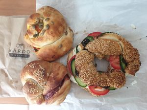 Two types of acmas, Simit salad sandwich at Kardo Cafe and Eatery in Melbourne