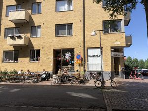 Lovely seating area outside on both sides of the street   at Flax in Malmo