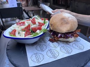 Vegan pulled pork sandwich and salad.  at Groove in Genoa