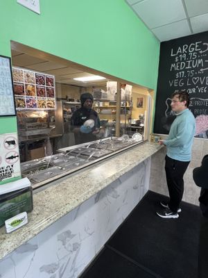 Ordering at the counter.  at Belmont Vegetarian Restaurant in Worcester