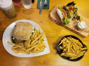 Chicken and Avacado Burger, Fish Finger Tacos (requested without cucumber) and Garlic Cashew Parm Fries at The Eating Gorilla in Penrhyndeudraeth