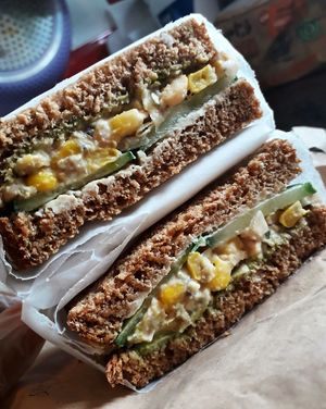 'Spicy Chics' mashed chickpeas with mayo, sweetcorn and onion with a spread homemade spicy pea chutney and cool cucumber...a big hit! at The Humble Veg  in West London