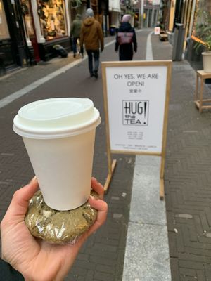 cookie and matcha latte  at Hug The Tea in The Hague