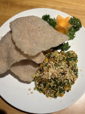 Mushroom and tofu served with a crispy pancake   at Sen Vegan House in Ho Chi Minh City