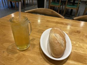 Iced tea and a bread  at Sen Vegan House in Ho Chi Minh City