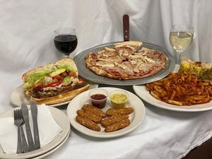 Vegan: “steak” hoagie, “wings” (note: shared fryer), “chicken and cheese” pizza, pasta, garlic bread (vegan butter) at Giovanni's in Pittsburgh