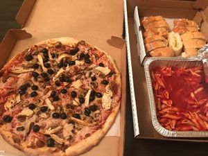 Vegan cheese and chicken pizza with olives and mushrooms, pasta with pizza sauce, garlic bread with vegan butter  at Giovanni's in Pittsburgh