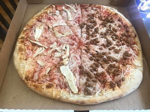 Half Vegan chicken and cheese; half vegan sausage and cheese pizza at Giovanni's in Pittsburgh