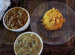 Sides platter - chakalaka, jollof rice and dovi collards (which were surprisingly creamy) at Zweli's Kitchen in Durham