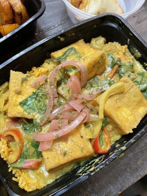 Dovi tofu, v disappointing, saturated with turmeric, did not taste peanut butter stew at all   at Zweli's Kitchen in Durham