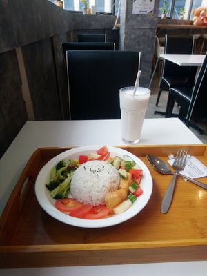 Sweet and sour tofu + kiwi milkshake. at Minf Houze Vegan Cafe in Kuala Lumpur