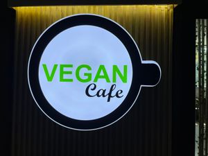 The shop logo at Minf Houze Vegan Cafe in Kuala Lumpur