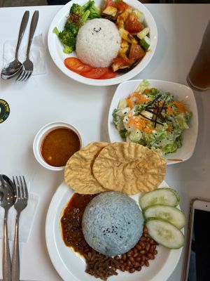 Vegan Nasi Lemak (on the bottom) at Minf Houze Vegan Cafe in Kuala Lumpur