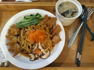 "Healthy" Dry Wantan PanMee. Not sure what is healthy about a big pile of noodles with deep fried beancurd and wonton pastry. Not enough vegetables!!! at Minf Houze Vegan Cafe in Kuala Lumpur