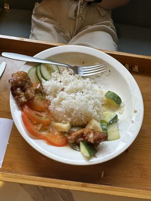 Fried mushrooms with pineapple cucumber and tomato plain ricee  at Minf Houze Vegan Cafe in Kuala Lumpur