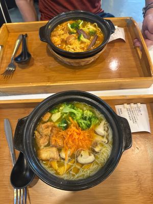Top curry ramen, bottom pumpkin mee hun soup  at Minf Houze Vegan Cafe in Kuala Lumpur