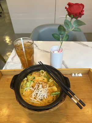 Curry Ramen and ice lemon tea  at Minf Houze Vegan Cafe in Kuala Lumpur