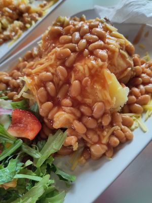 Jacket potato, vegan cheese and beans at Baobab Cafe in Loughborough