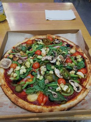 20cm (?) pizza 3.65 BHD. Good choice of veggie toppings and nice spicy tomato base. Friendly helpful staff at Blaze Pizza in Manama
