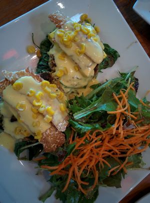 Sea Cake Benedict brunch (15$). Really delicious.
It has their vegan sea cake, sauteed greens, topped with tempeh hummus, cashew cheese and corn, served with salad.
Ask for toast next to it, as it doesn't come with toast. at Real Food Daily in West Hollywood