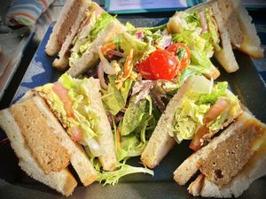 The club sandwich Caesar salad.   at Real Food Daily in West Hollywood