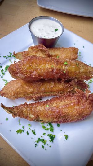 Whole fried pickles! 🥒   at Real Food Daily in West Hollywood