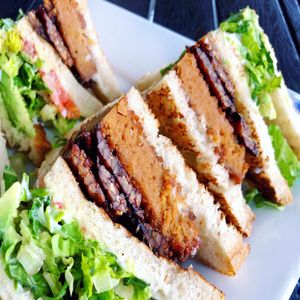 Vegan Club with Tempeh Bacon, Seitan & Avocado  at Real Food Daily in West Hollywood
