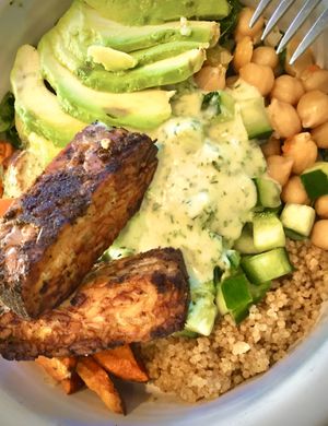 Build Your Bowl: Marinated Tempeh, Quinoa, Chickpeas, Sweet potatoes, Diced cucumbers, Sautéed kale, Avocado and House Tahini dressing. ✨Delicious  at Real Food Daily in West Hollywood