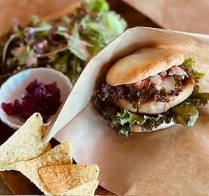 Soy burger on rice flour bun at Orange County Cafe in Tondabayashi