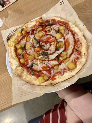 11” MOD crust, red sauce, vegan cheese, roasted garlic, red onions, roasted pineapples, chopped basil, roasted red peppers, and BBQ sauce swirl 🤤🌱 at MOD Pizza - Alliance in Fort Worth