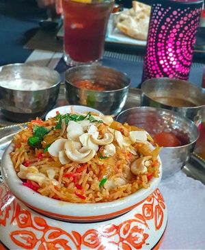 Awesome authentic Fire and fried rice! Works well with Raita and Punjabi Lassi 🙂  at Tamarind Hill in Zurich