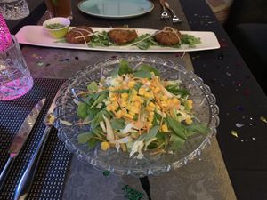 Indian summer salad and pan fried potato cakes accompanied by a tamarind-date sauce, mint and green apple chutney. at Tamarind Hill in Zurich